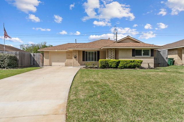 1214 W 31st St — Shepherd Forest