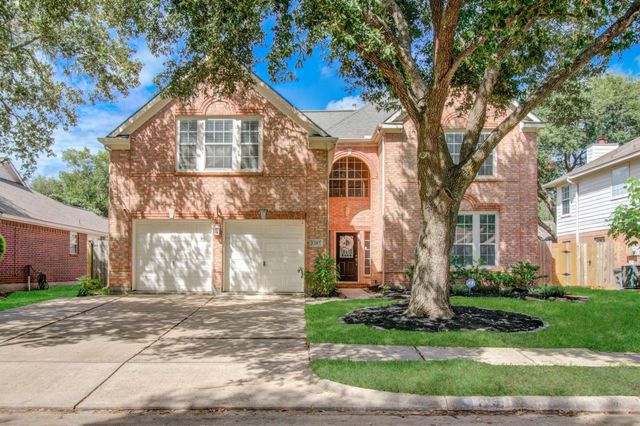 1207 Atlanta Dr — The Grove Sec 12